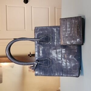 Well loved blue Michael Kors handbag‎ and matching wallet